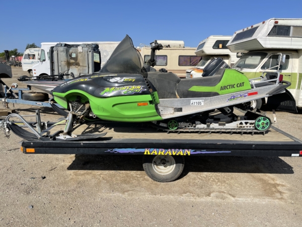 Snowmobile and trailer